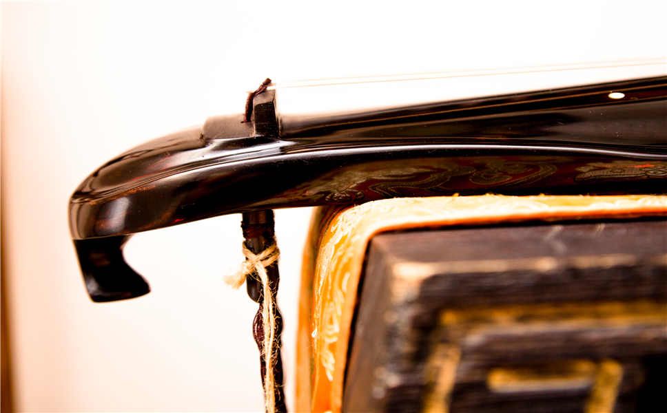 如何处理古琴轸打滑？